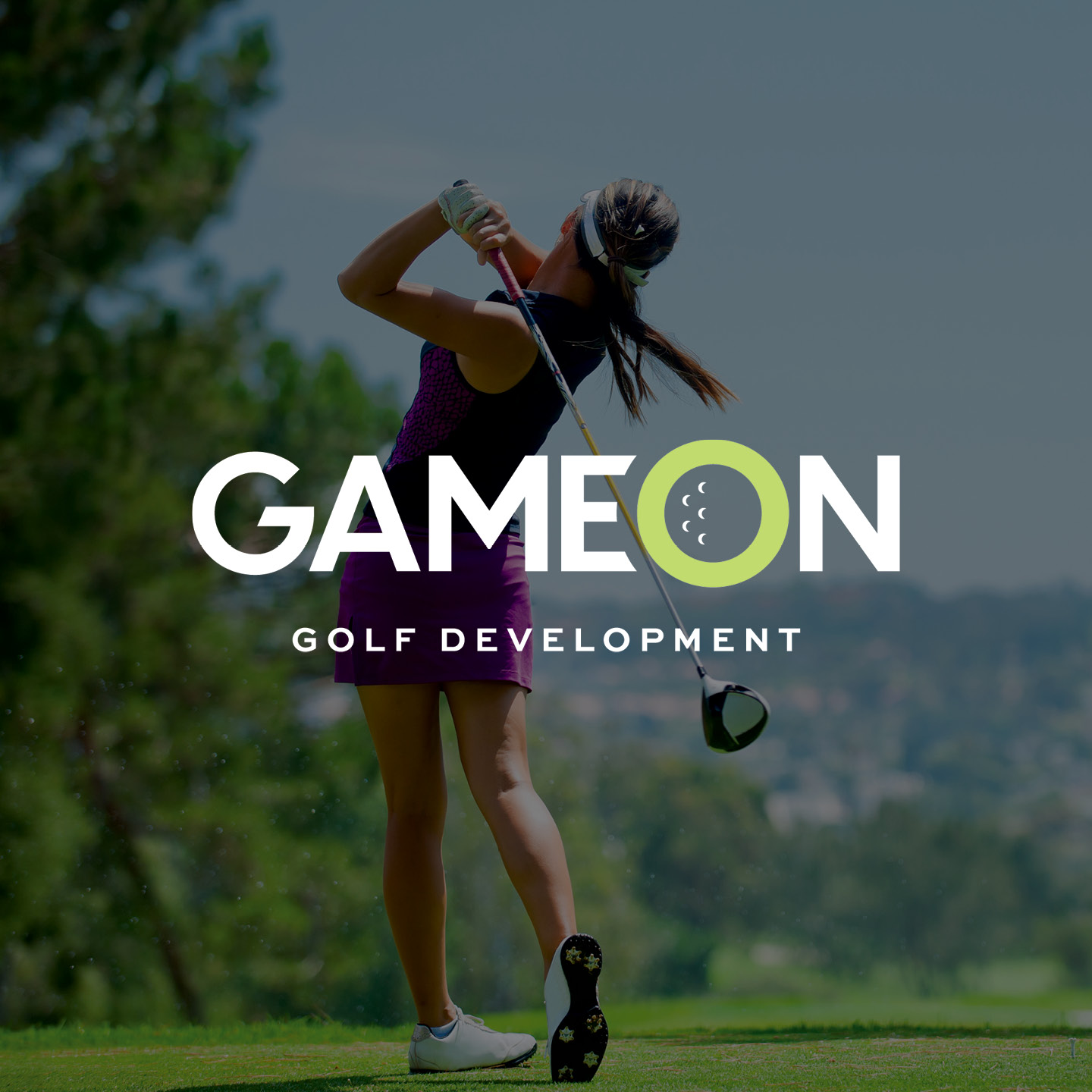 Woman swinging a driver