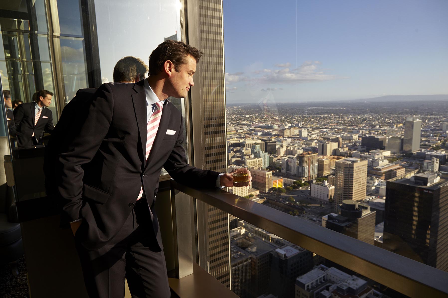 City Club Los Angeles - Members looking out window