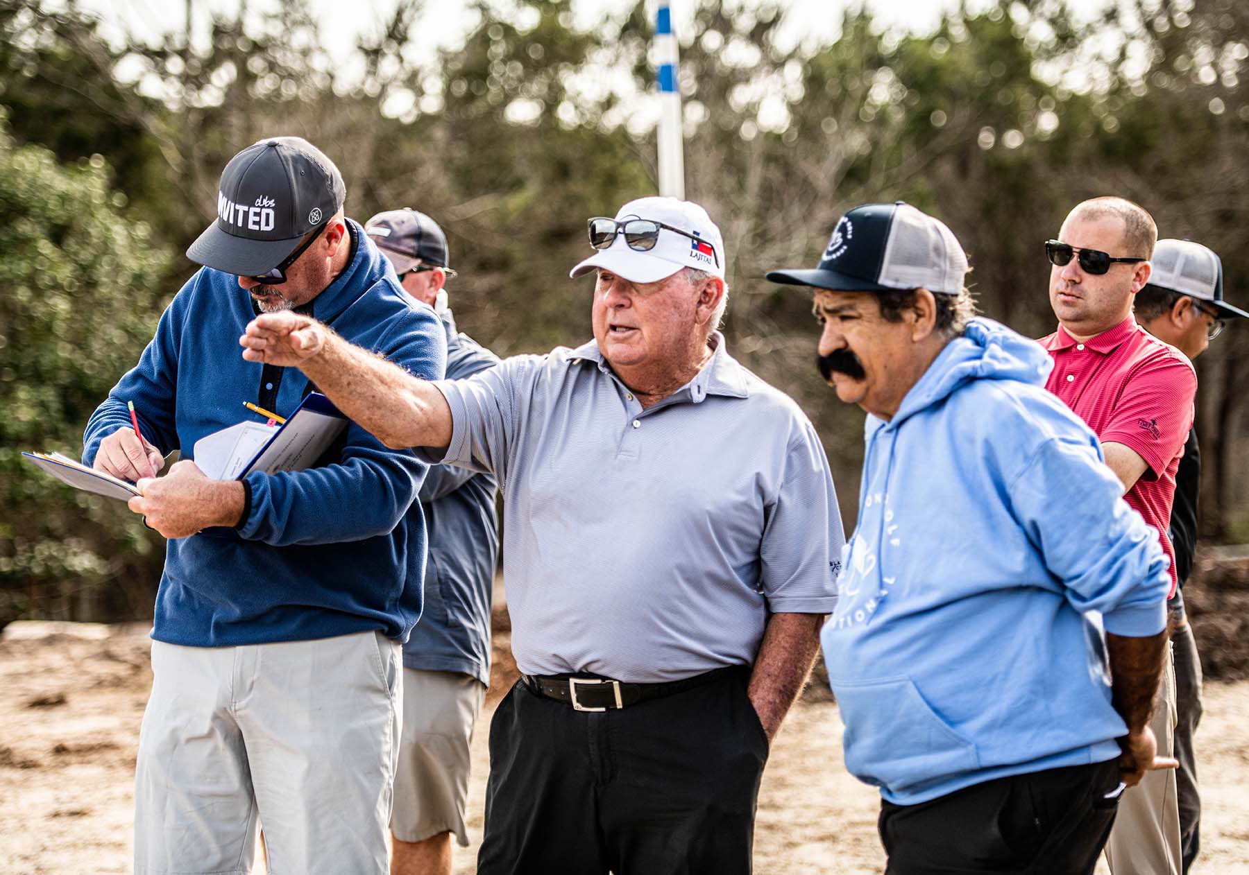 Course designers discussing renovation at Lost Creek