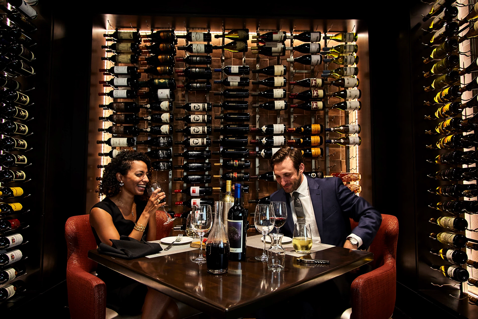 Rivers Club - Couple in Wine Room