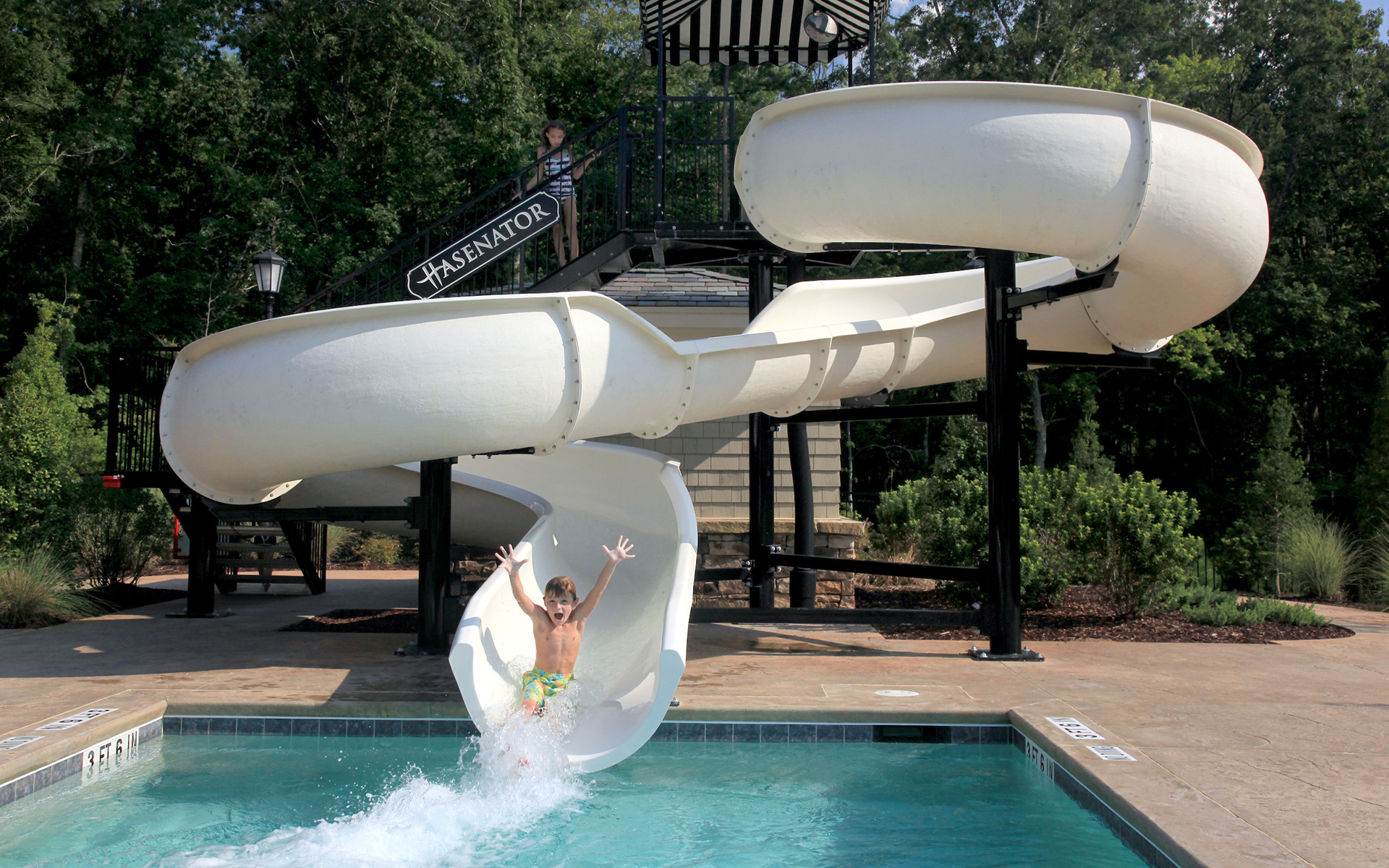 The Hasentree Club - Child on slide